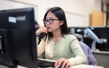 female student at a computer